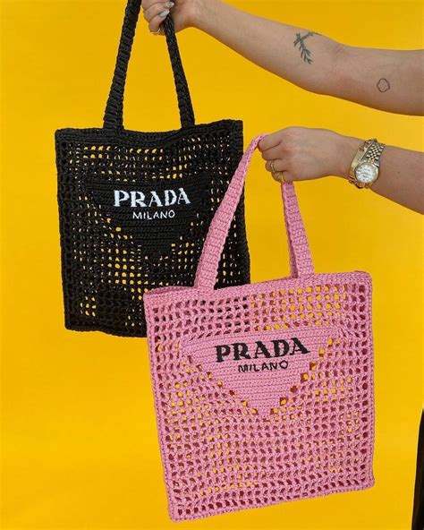 prada bag beach